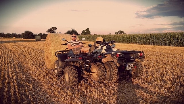 Farm ATVs in a field